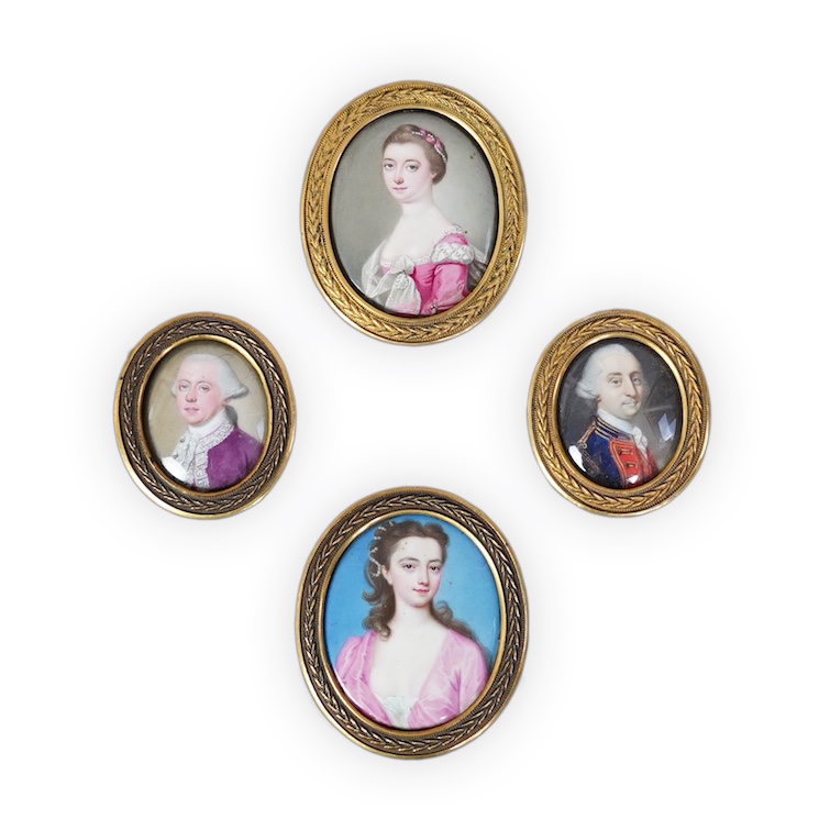 English School c.1760, Miniature portraits of the Cartwright Family, enamel on copper (4), largest 4.5 x 3.75cm, framed as one